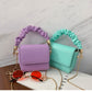 beautiful design and colour handbags kids handbags and purple with green colour