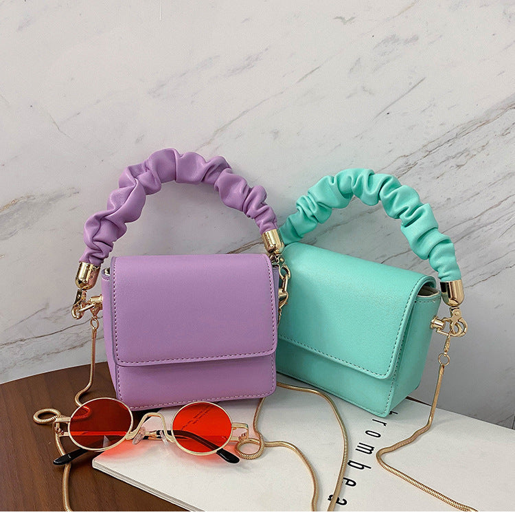 beautiful design and colour handbags kids handbags and purple with green colour